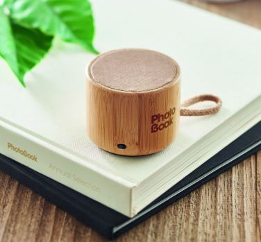 Logotrade promotional items photo of: Round bamboo wireless speaker