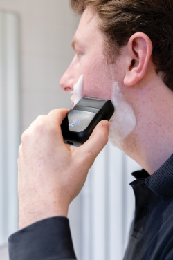 Logo trade ärikingi pilt: TrimBlade laetav reisipardel IPX7